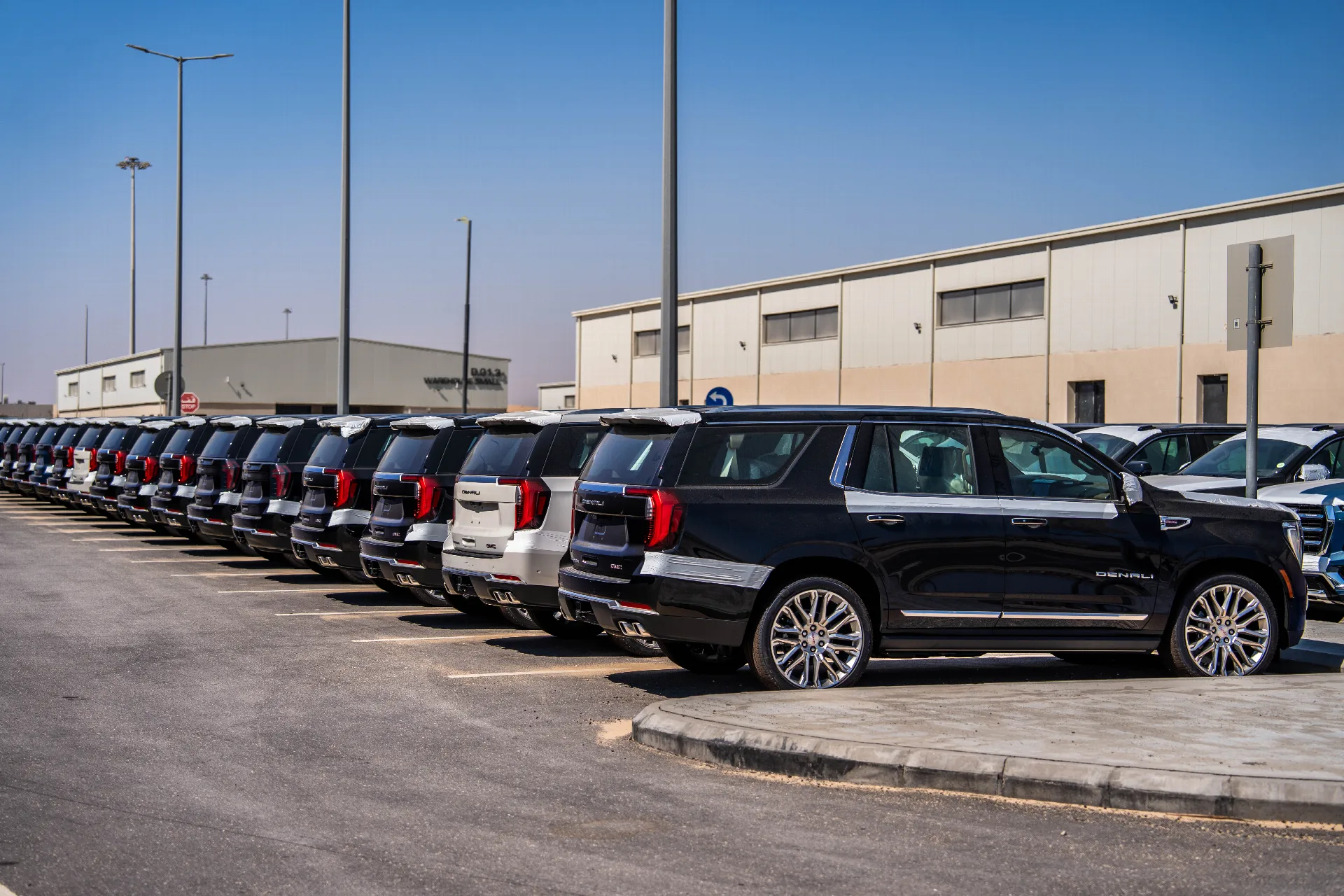Vehicles stored in rows at SPARK Logistics