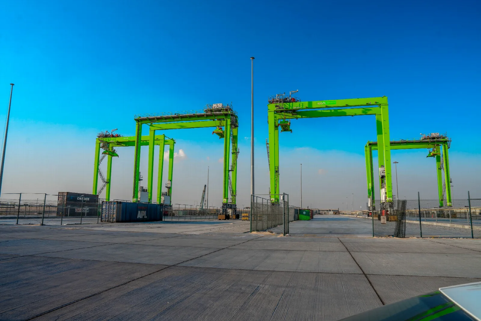 Shipping containers and cranes in the SPARK container yard
